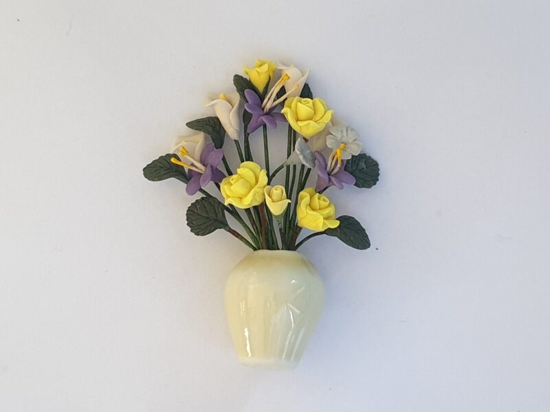 Yellow and Purple flowers in vase